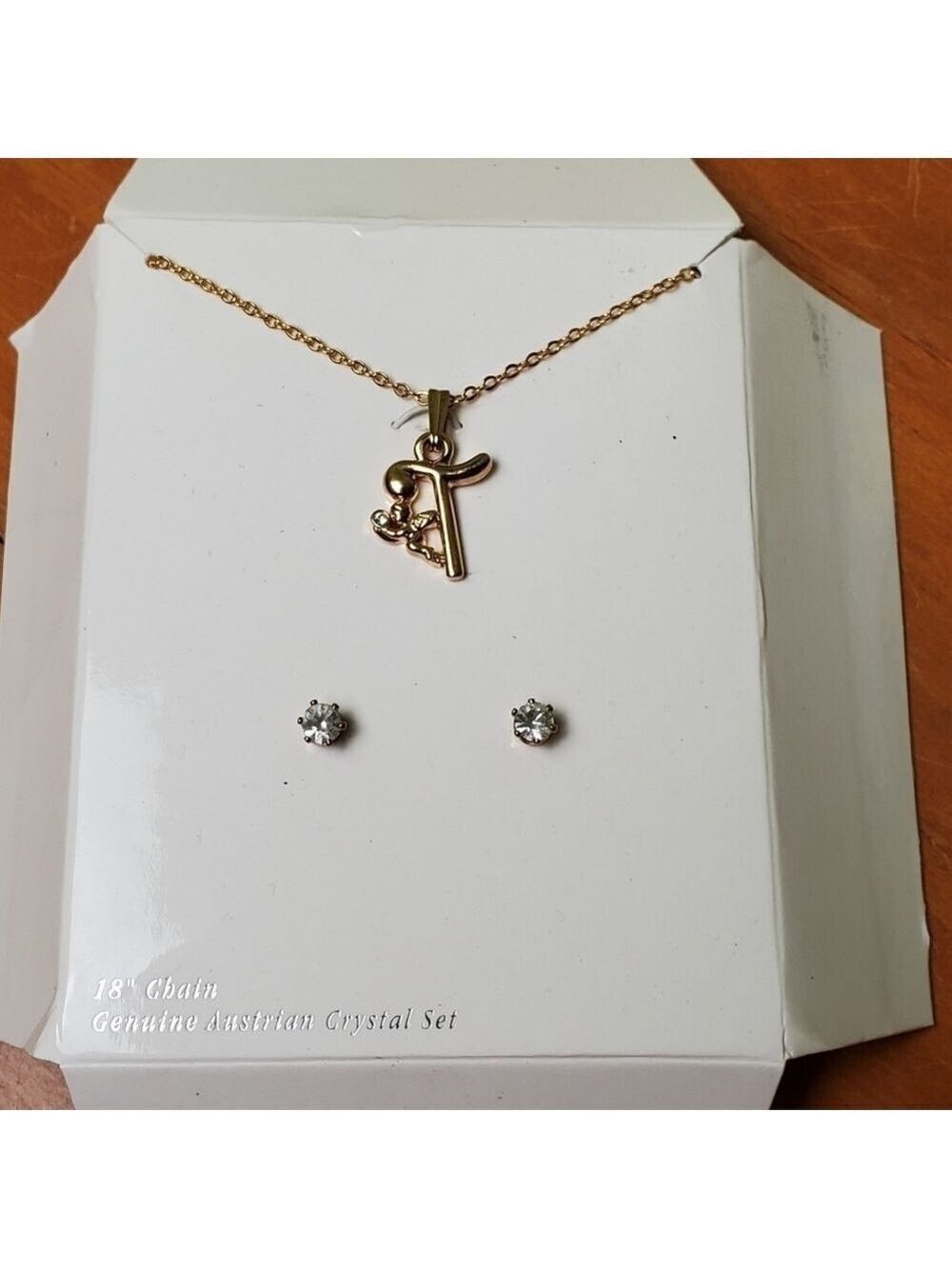 NWOT necklace and earrings set, gold colored, letter T pendant and clear stones
